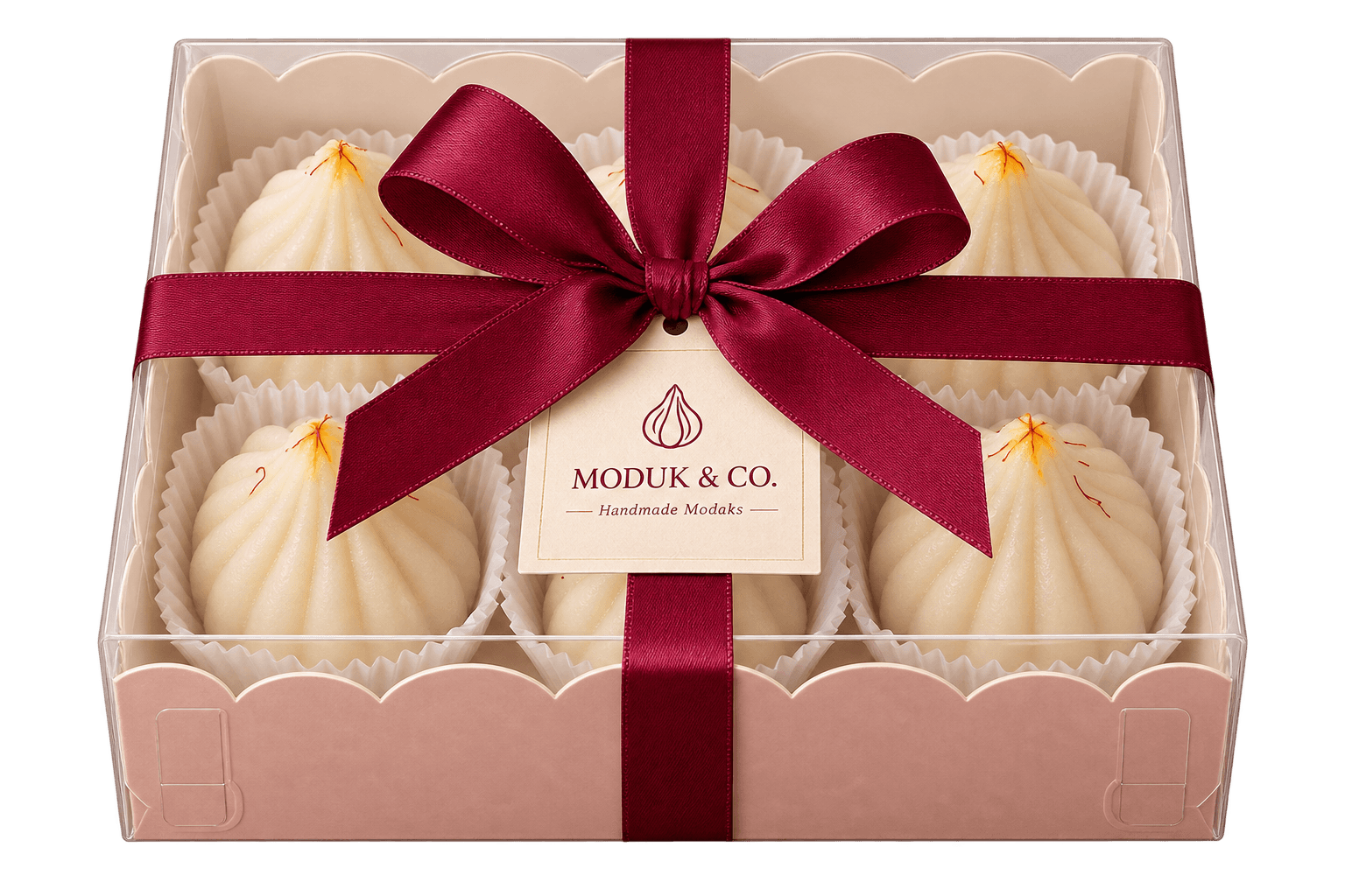 A Moduk & Co gift box of six handmade modaks, tied with a ribbon